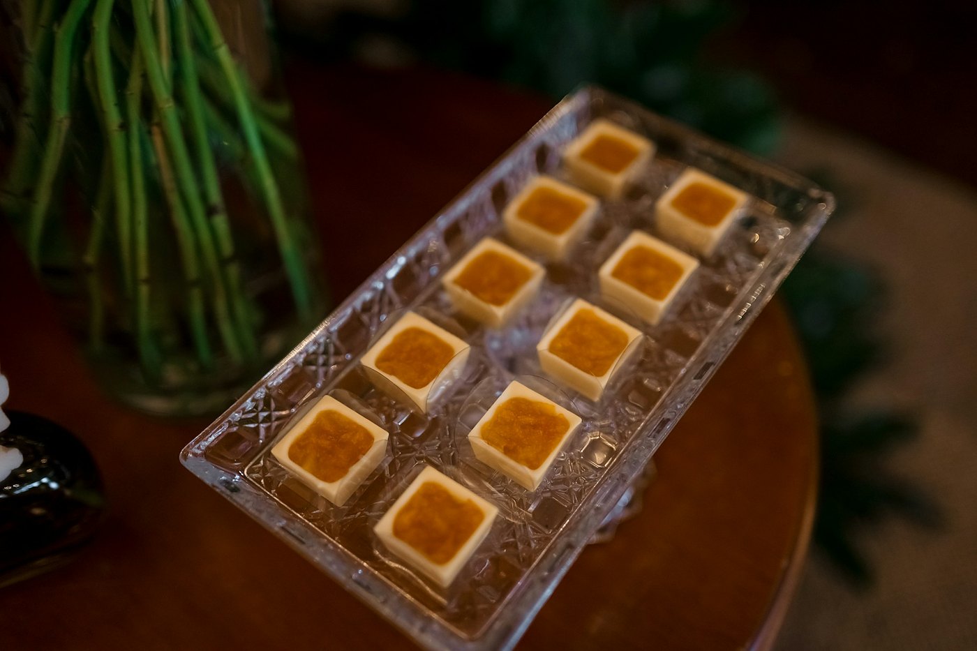 Filled chocolates in a clear chocolate mould